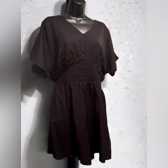 NWT Dokotoo Women’s Doll-man Short Sleeved Sports Jumper Black Sized L - Picture 1 of 10